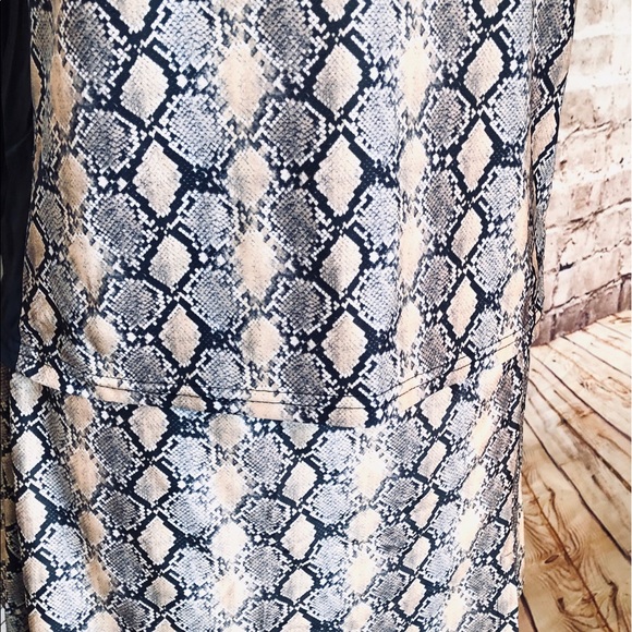 Tennis Top and Skirt with Shorts in Animal Print - Picture 4 of 7